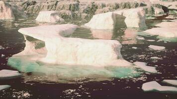 Close-up of iceberg on black sand shore video