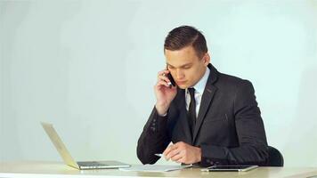 Young businessman talking on the phone video