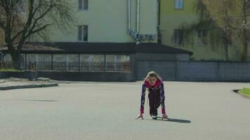 Young girl doing a race at the stadium video
