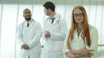 Portrait of cheerful women doctor video