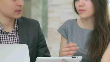 Close-up of hands of young attractive business man and woman video