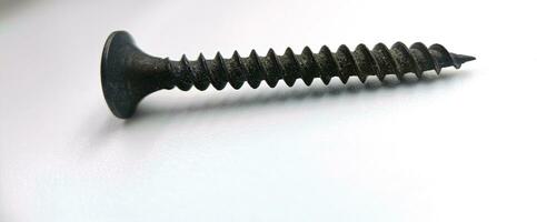 A screw from different perspectives on a white background photo