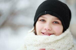 child in the background of a snow-covered city. photo