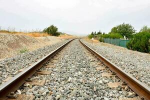 railroad tracks in the countryside photo