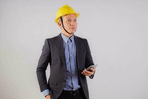 Asian male engineer on white background photo