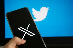 July 25, 2023, Russia. The logo in the form of the letter X displayed on the smartphone. Twitter rebranding, and implementation of X. photo