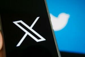 July 25, 2023, Russia. The logo in the form of the letter X displayed on the smartphone. Twitter rebranding, and implementation of X. photo