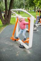 WORKOUT street. Baby on the Street simulator FEET BREEDING in a city park. Easy-to-use cardiovascular fitness equipment. Prevention of cardiovascular diseases. photo