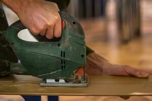 Mastering the Art of Woodwork A skilled carpenter wields photo