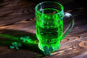 Traditional green beer, St. Patrick's Day. Brewed Irish beer in a bubble for the holiday photo