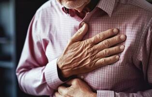 AI generated Urgent Health Issue - Aging Man Experiencing Severe Chest Pain - Heart Concern - Generative AI photo