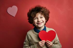 ai generado contento pequeño chico con rojo corazones en San Valentín día. foto