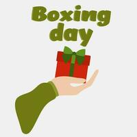 Hand holding a gift box. Flat design banner with Text Boxing Day. Usage for Postcard, web site, headers, blog posts, print. December 26 Celebration Poster, Advertisement. Gifts giving design concept vector