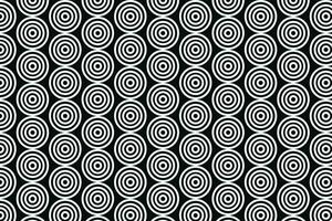 Pattern of White Circles with Concentric Rings on a Black Background vector