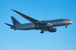 Qatar Airways passenger plane at airport. Schedule flight travel. Aviation and aircraft. Air transport. Global international transportation. Fly and flying. photo