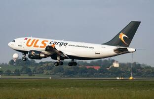 ULS Cargo Airbus A310 TC-VEL cargo plane arrival and landing at Vienna Airport photo