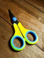 scissors with yellow plastic handles photo