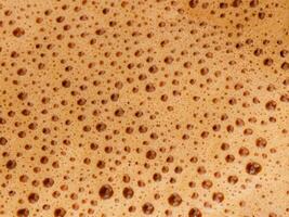close up coffee with foam texture photo