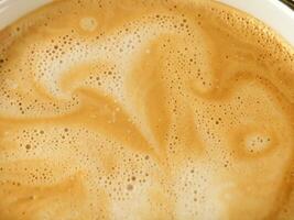 close up coffee with foam texture photo