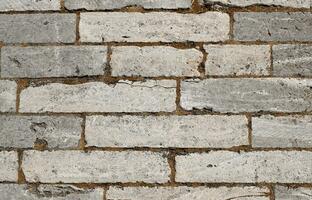 Old grey brick wall photo