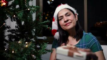 Woman sending gifts at Christmas video