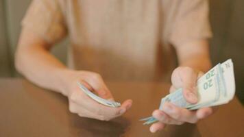 Male hands counting a lot of money, counting money background of finance dollars and people video