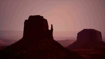 Sunset at the sisters in Monument Valley video