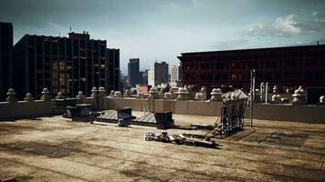 A city skyline with towering buildings and a prominent roof in the foreground video