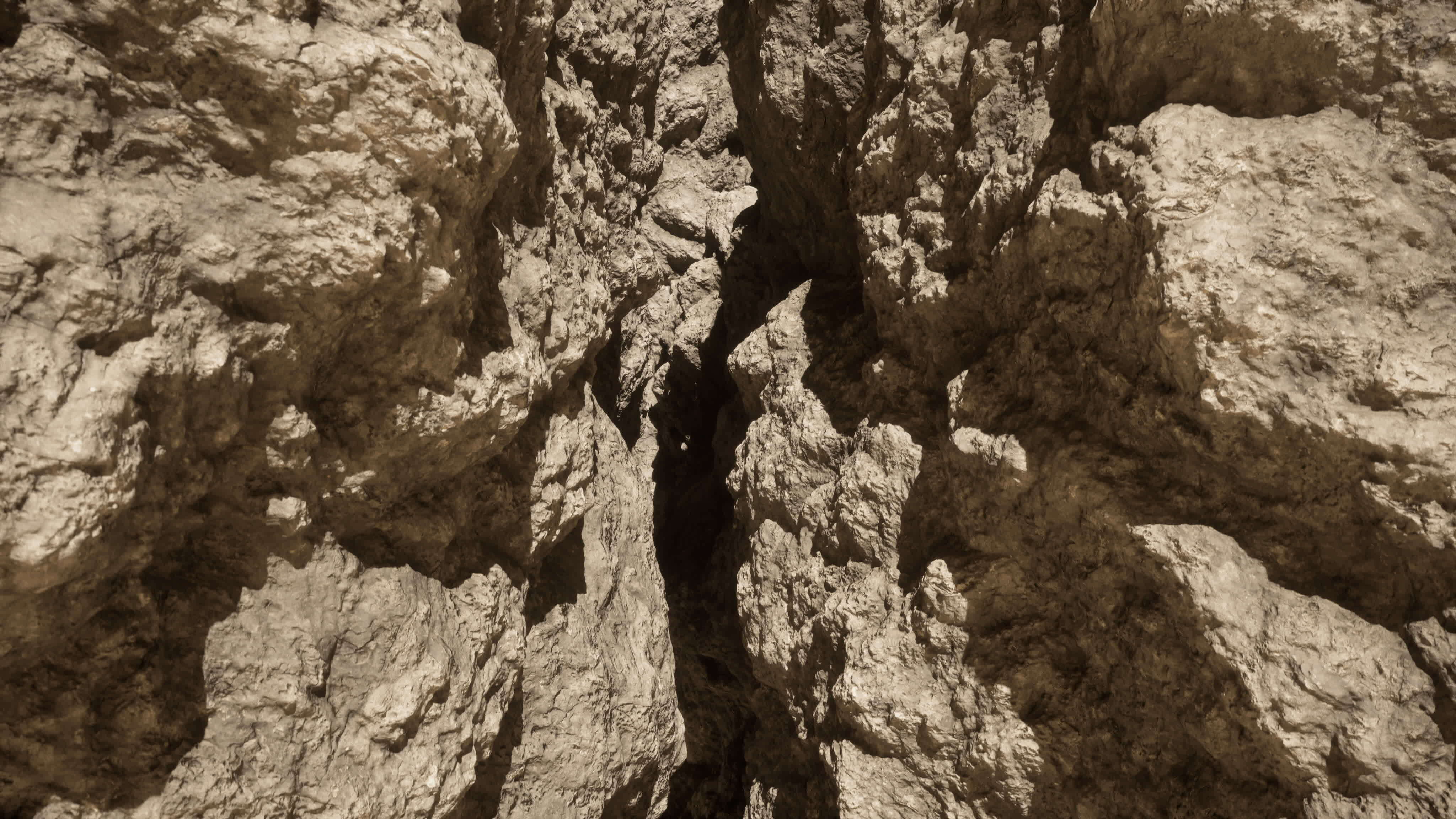 A very tall rock formation with a sky background 34802978 Stock Video