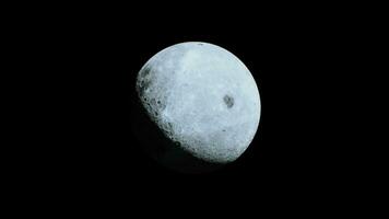 moon partially illuminated by the sun's rays as viewed from orbit video