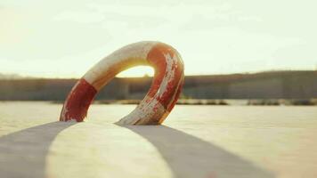 Lifebuoy on the city beach at sunset video