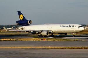 Lufthansa cargo plane at airport. Air freight shipping. Aviation and aircraft. Air transport. Global international transportation. Fly and flying. photo