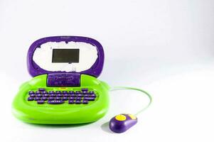 a purple and green computer with a mouse photo