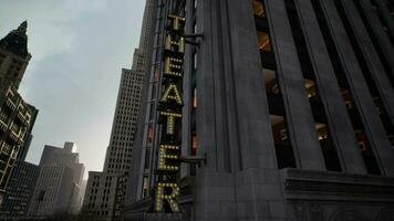 A theater sign on a tall building video