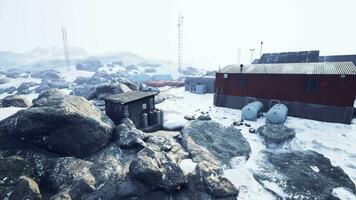 antarctic base set in a natural harbor in front of the Antarctic Peninsula video