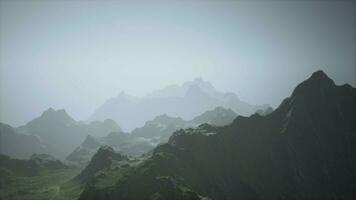 A misty mountain range surrounded by fog video