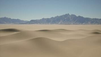 A desert landscape with mountains in the distance video