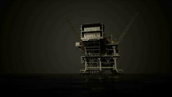 A towering oil rig in the middle of the ocean video