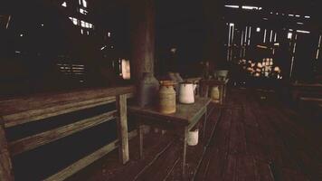 A wooden bench with a row of jars on top video