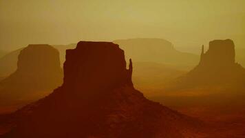 Sunset at the sisters in Monument Valley video