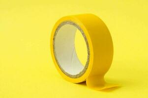 a yellow tape on a yellow background photo