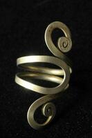 a ring with a spiral design photo