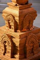 a large carved structure made out of clay photo