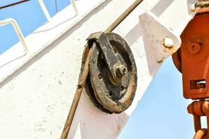 a close up of a crane with a wheel attached photo