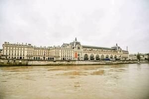 a grand building on a river photo