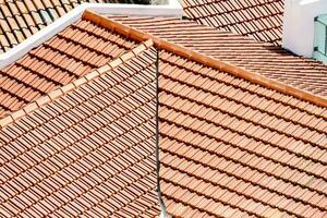 a view of a roof with red tiles photo