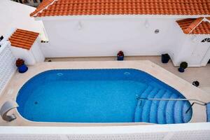 a view of the pool at a villa photo