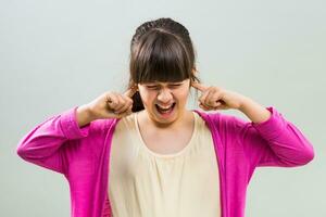 Furious little girl doesn't want to listen photo