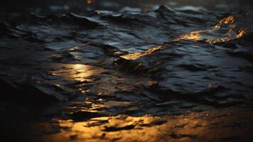 Heavy crumpled black paper texture in low light background. photo