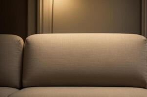 A couch with a light shining on it photo